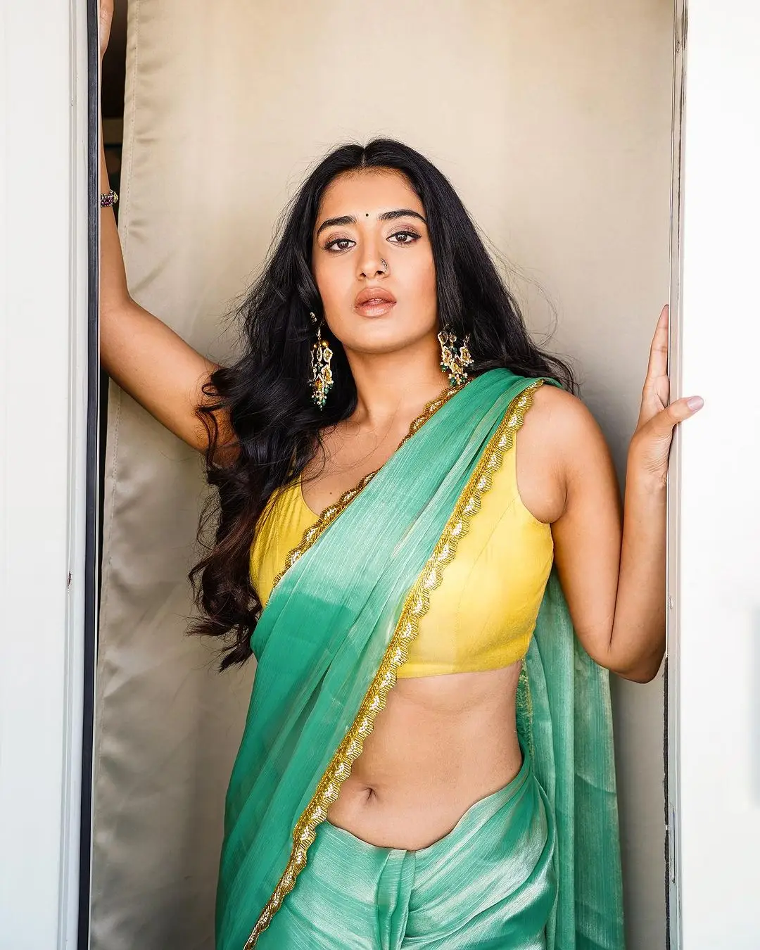 Rashi Singh in Green Saree Yellow Sleeveless Blouse